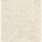Beige shaggy rug with a textured surface