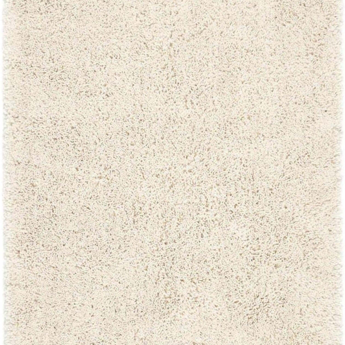 Beige shaggy rug with a textured surface