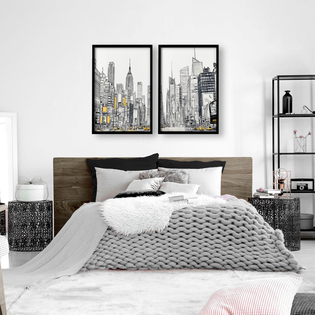 Modern bedroom with a bed, nightstands, and wall art of cityscapes.