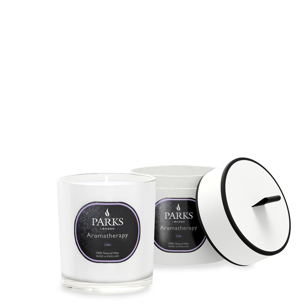 Parks Aromatherapy candle with lid on a white background