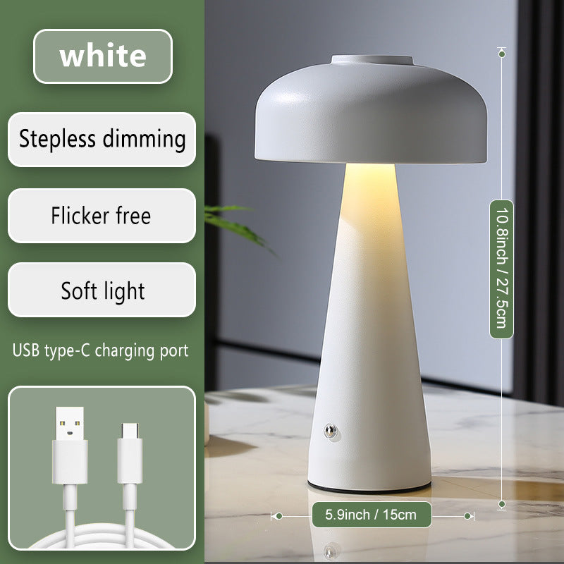 White table lamp with USB charging port on a neutral background