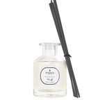 Parks diffuser bottle with black reeds on a white background