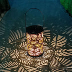 Cross-border Retro Solar Lantern Iron Hollow Storm Lantern Courtyard Decoration Desk Lamp Garden Projection