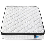 White quilted mattress on a white background