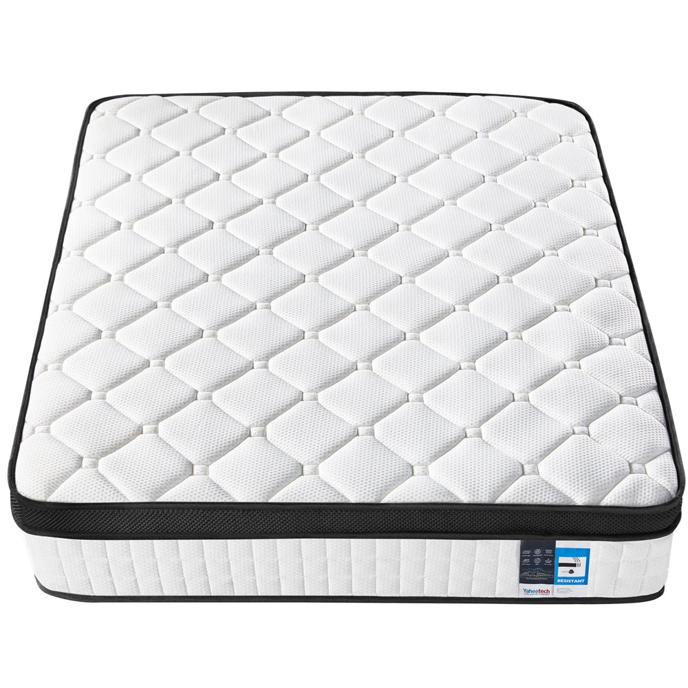White quilted mattress on a white background
