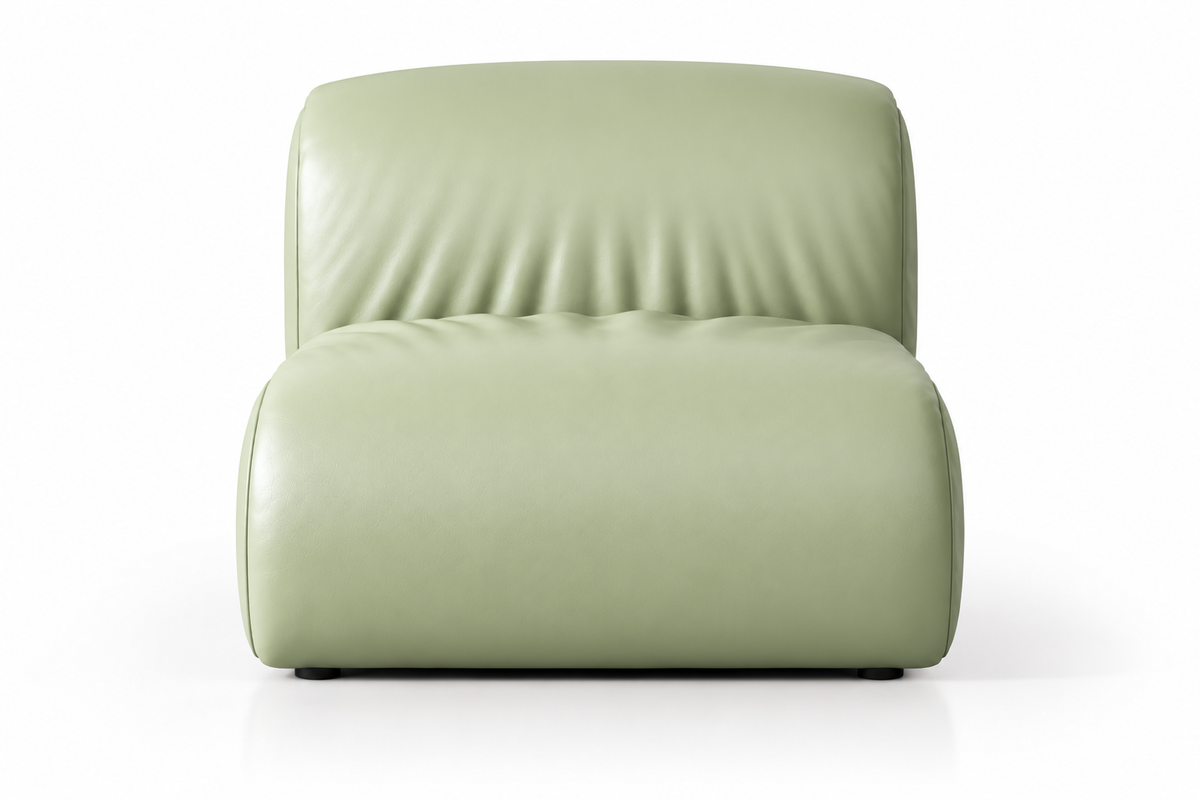 A modern low-profile armchair upholstered in light sage green leather, shown from the front against a clean white background.