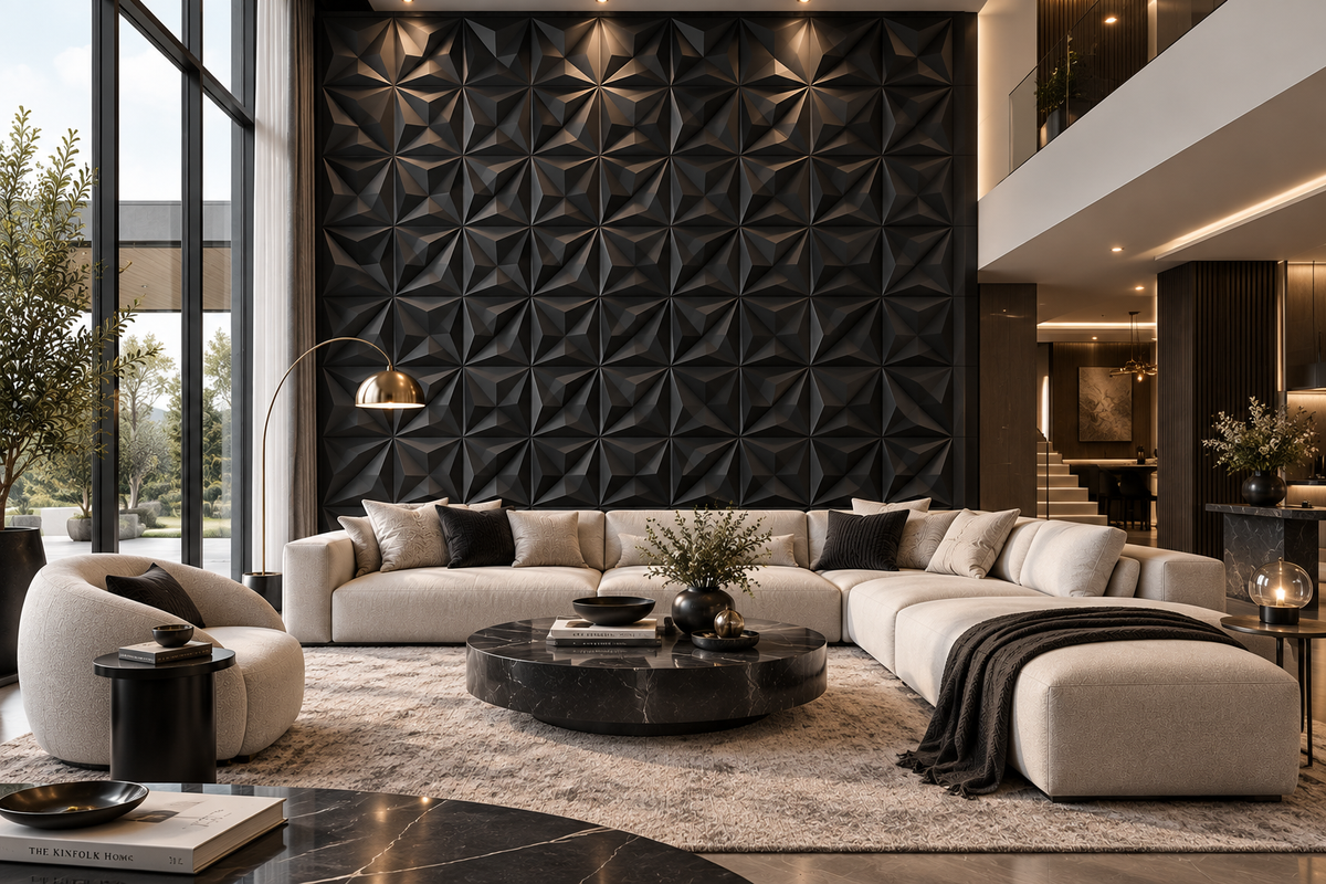 A modern living room featuring a large beige sectional sofa with black accent pillows, a round black marble coffee table, a textured black geometric accent wall, and a light beige rug.