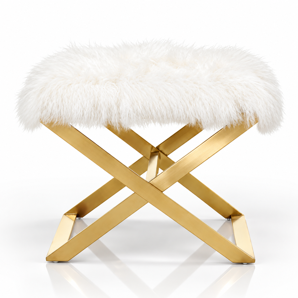 White faux fur ottoman with gold X-shaped metal frame on a white background