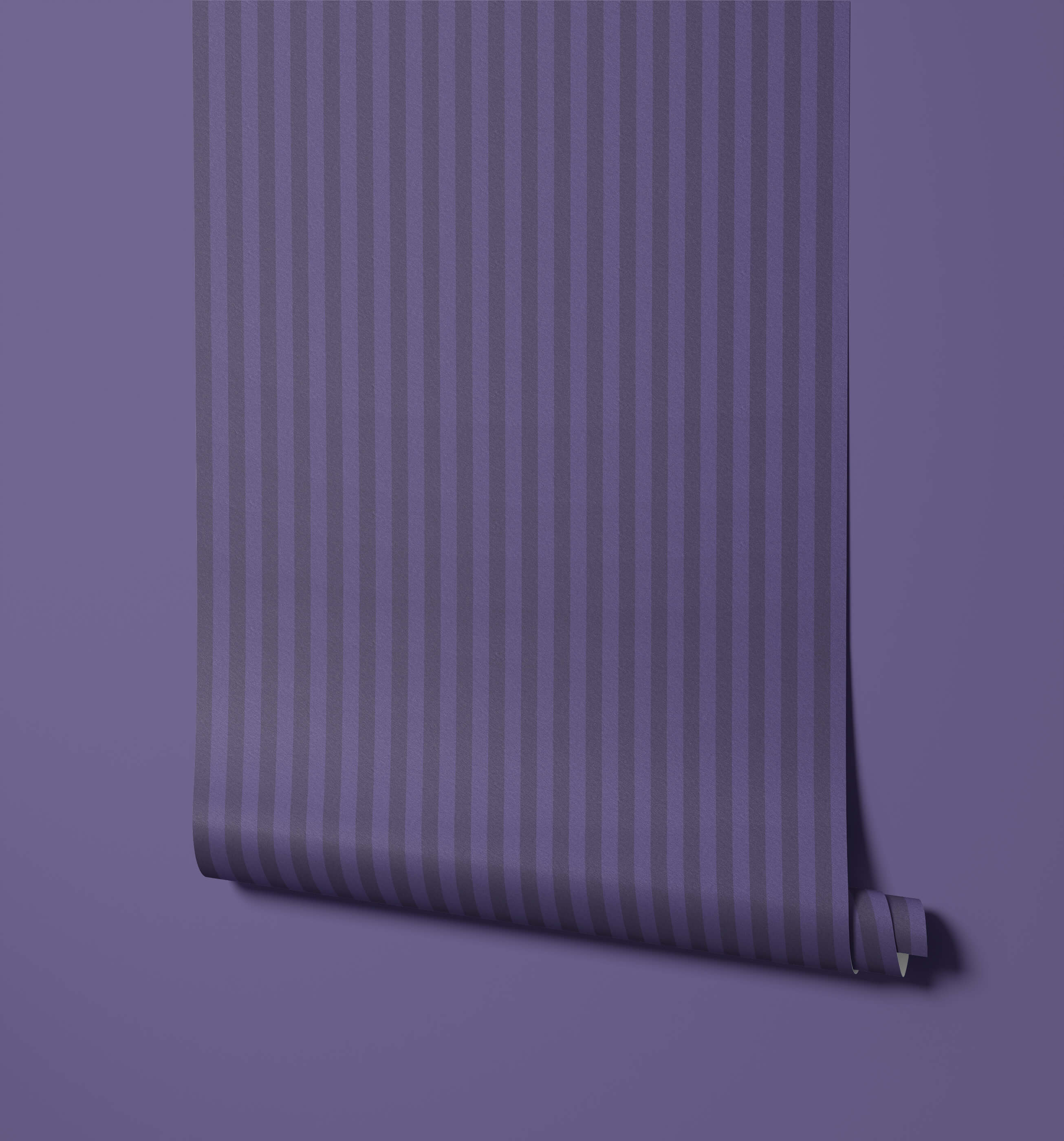 Roll of purple wallpaper with a subtle pattern on a matching purple background