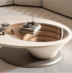 Modern living room with a Gray sofa, coffee table, and decorative elements.