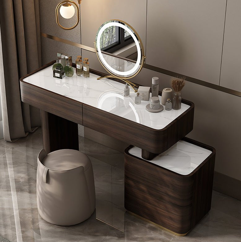 Dressing table with mirror and various items in a modern bathroom setting