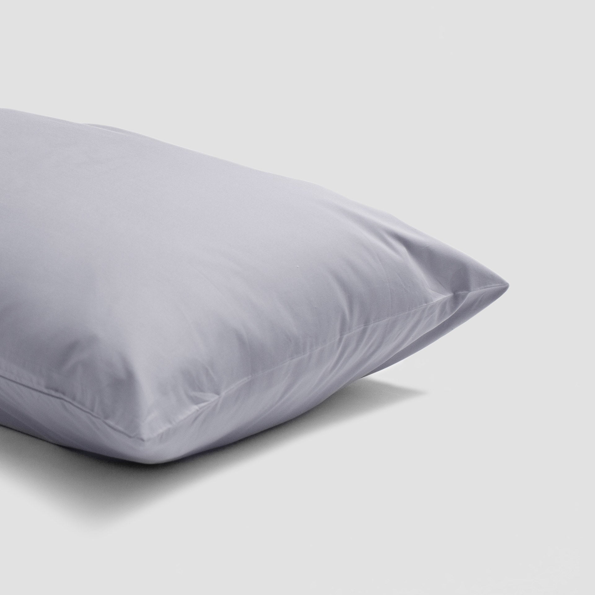 Gray pillow on a light gray background
