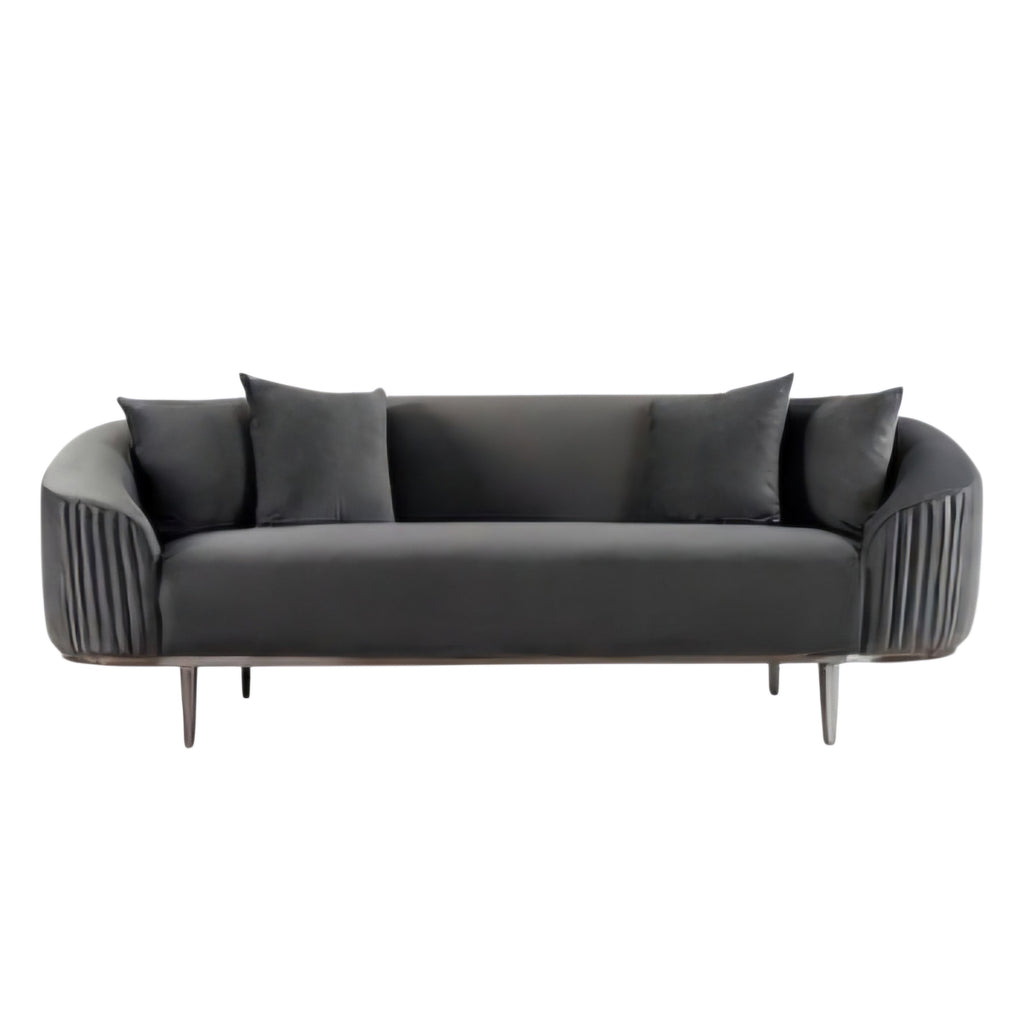 Modern black sofa with decorative cushions on a white background