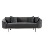 Modern black sofa with decorative cushions on a white background