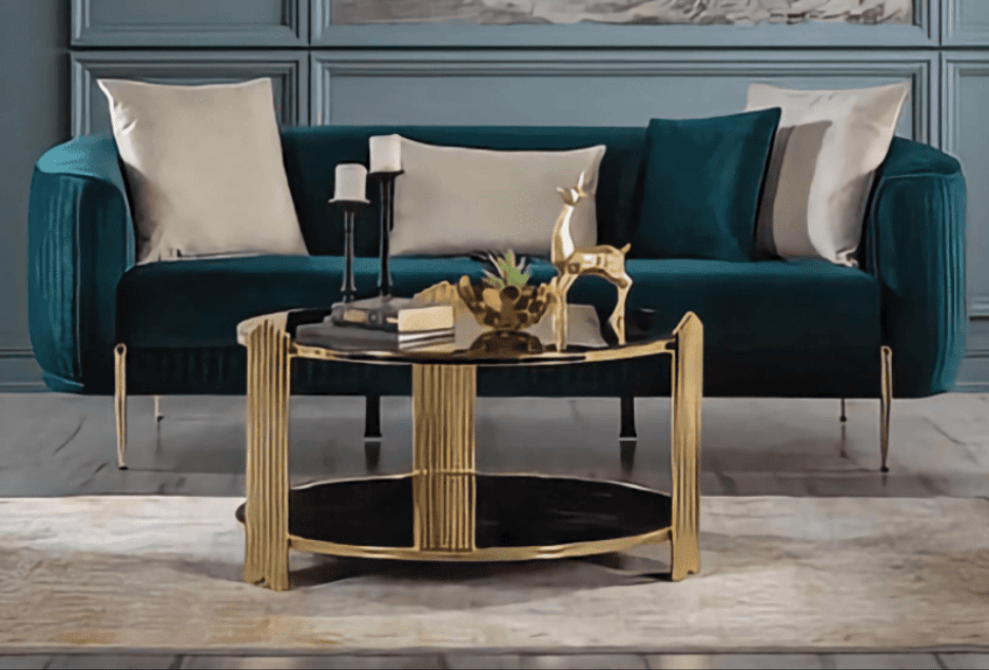 Modern living room with teal sofa and gold coffee table