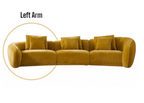 Mustard yellow sectional sofa with cushions on a white background