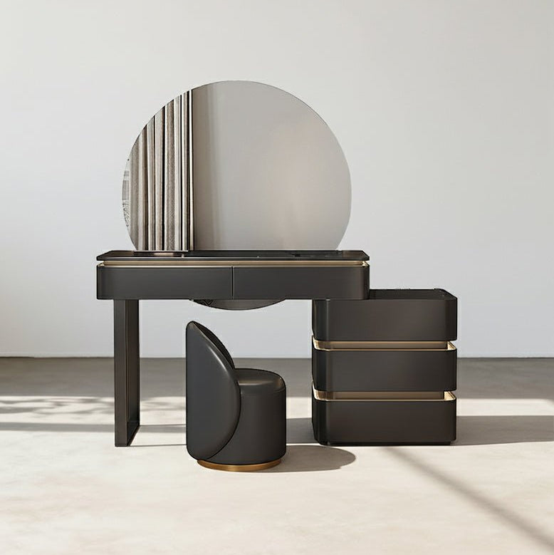 Modern vanity table with round mirror and stool in a minimalistic setting