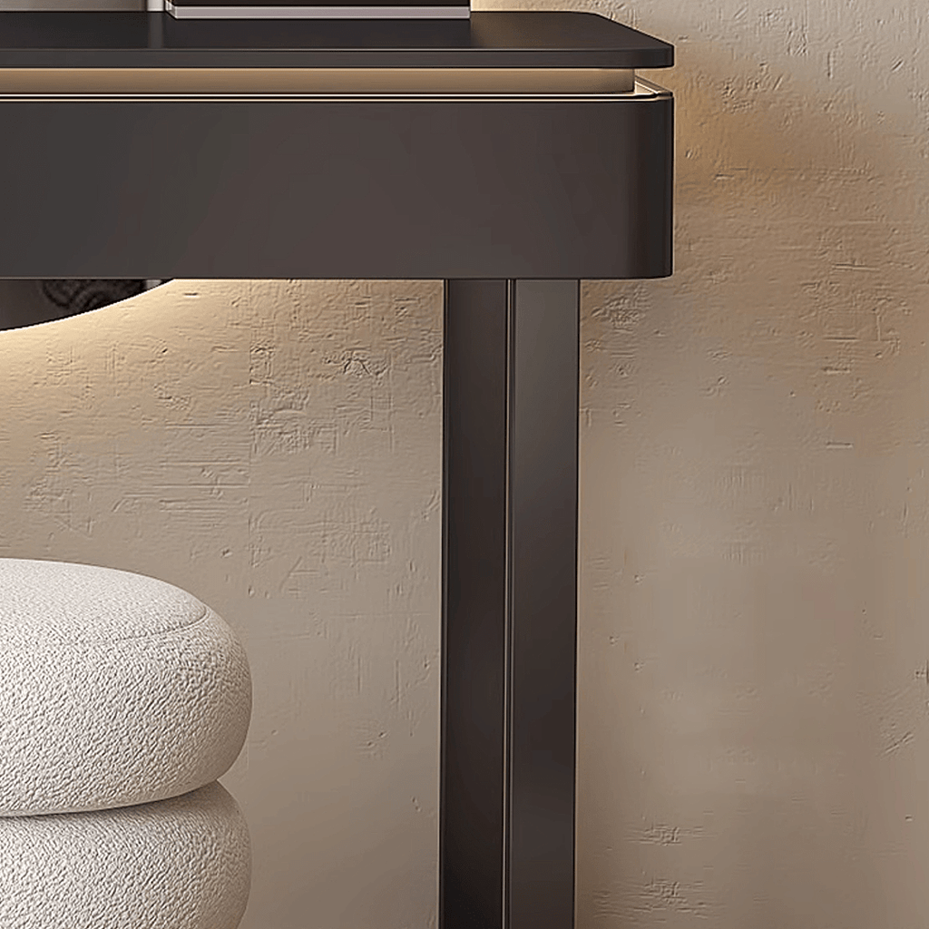 Dark brown rectangular table with a textured surface against a beige wall.