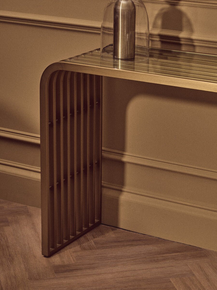 Matte Gold Slatted Console Table with Clear Glass Top | Vogue - MOOAZAA