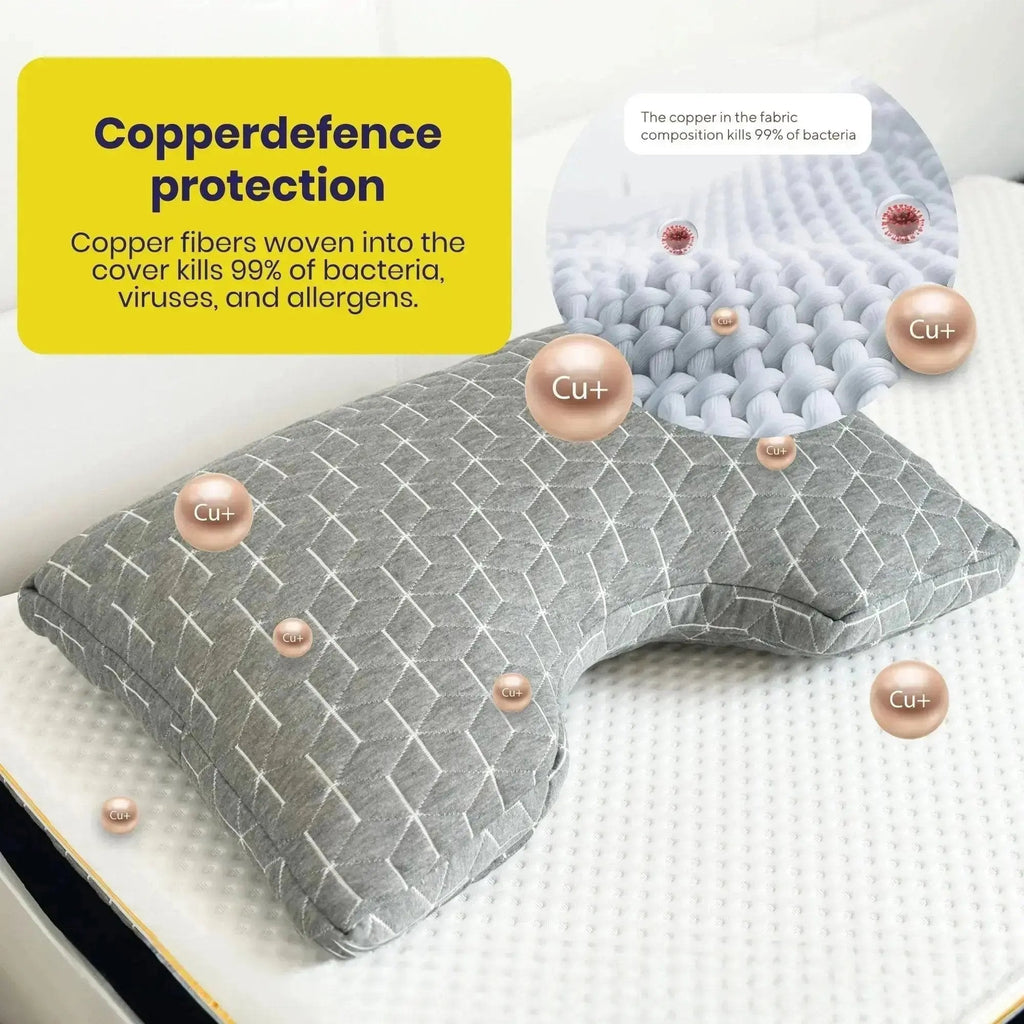 Gray pillow with copper defense protection feature on a white background