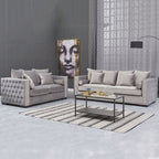 Modern living room with gray sofa set and decorative elements.
