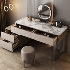 Modern vanity table with marble top, mirror, and stool in a room setting.