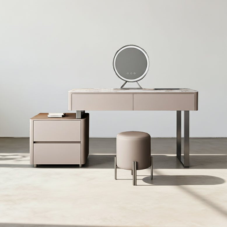 Beige vanity table with mirror and stool in a minimalistic room.