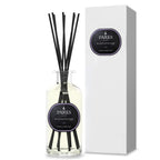 Parks aromatherapy diffuser bottle with black sticks and packaging on a white background