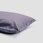 Purple pillow on a light gray background