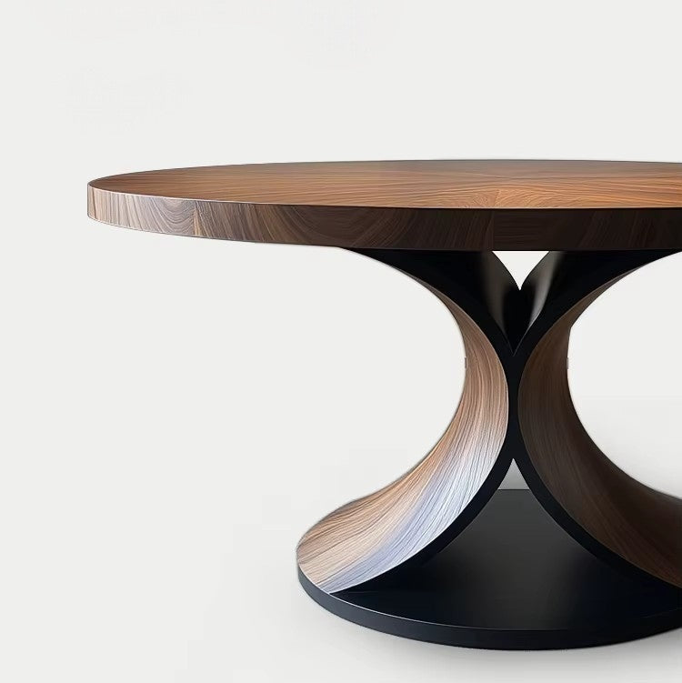 Modern round table with wooden top and black base on a white background