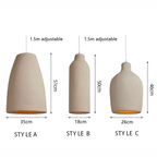Beige pendant light on a white background with text 'Model A-b-c.