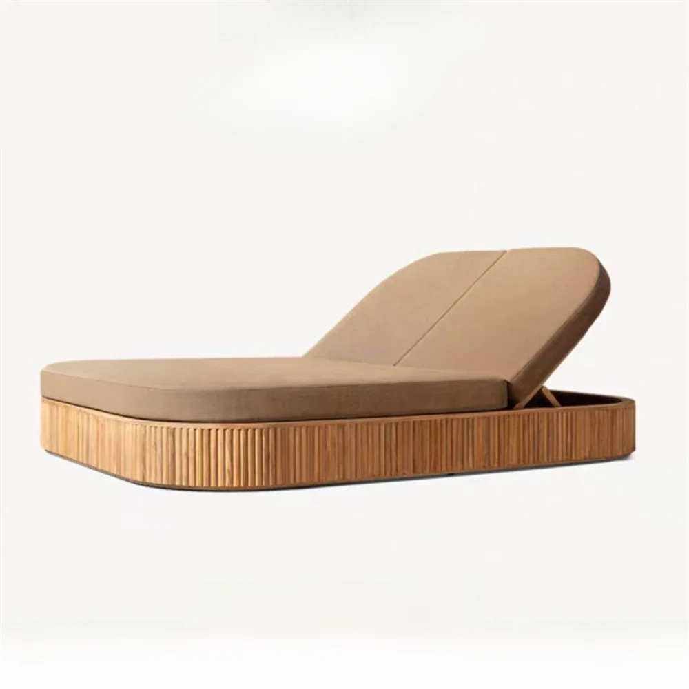 Beige outdoor lounge chair with wicker frame on a white background