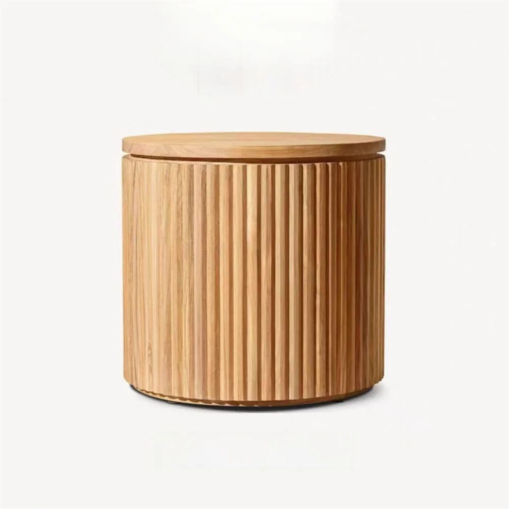 Wooden cylindrical container with a lid on a white background