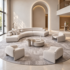 Curved cream bouclé sectional sofa with four matching armchairs in a modern living room
