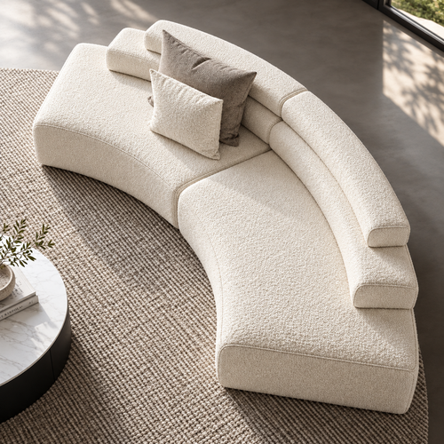 Curved modular sofa in warm off-white bouclé fabric