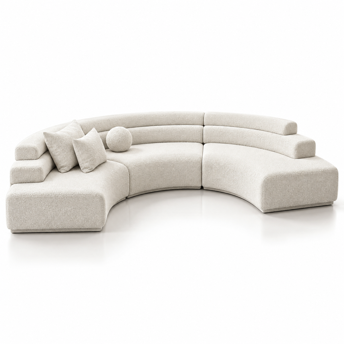 Modern curved modular sectional sofa in light warm off-white fabric on a clean white studio background, with matching throw pillows and a round cushion.