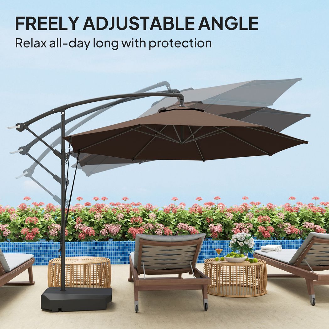 Brown patio umbrella with freely adjustable angle on a patio setting with chairs and flowers.