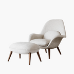White armchair with ottoman on a white background