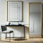 Modern interior with a console table, chair, and decorative items against a light wall.