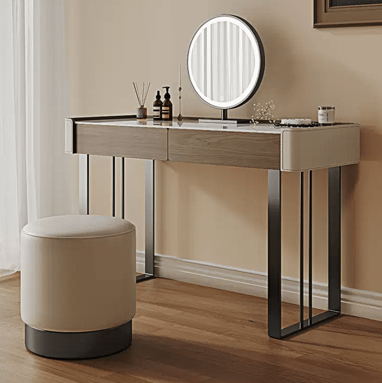 Dressing table with round mirror and stool in a room setting
