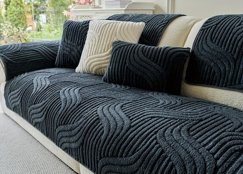 Dark blue textured sofa cover on a sectional sofa with measurements displayed.