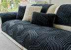 Dark blue textured sofa cover on a sectional sofa with measurements displayed.