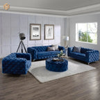Modern living room with blue tufted sofa set and decorative elements.