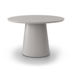 Round white table on a white background