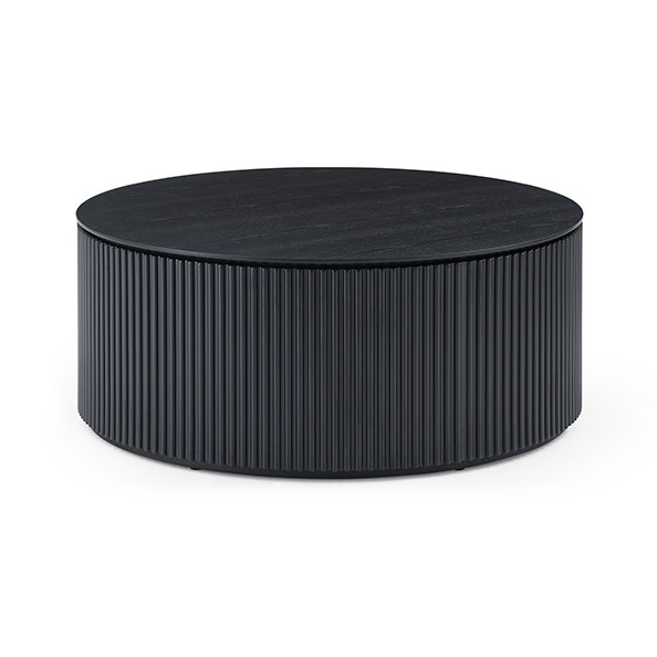 Round black coffee table with ribbed texture on a white background