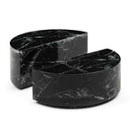Two black marble coasters on a white background