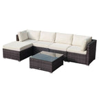 Outdoor furniture set with a sectional sofa and coffee table on a white background