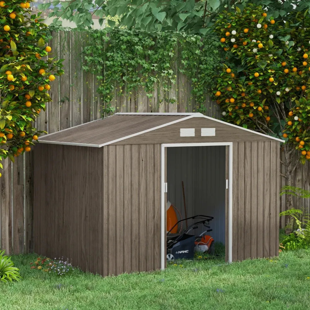 Wooden shed with open door in a garden setting with fruit trees