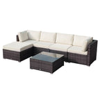 Outdoor furniture set with a sectional sofa and coffee table on a white background