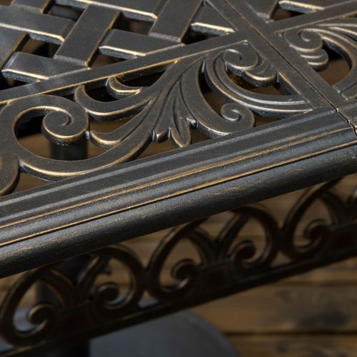 Close-up of ornate metalwork with intricate designs